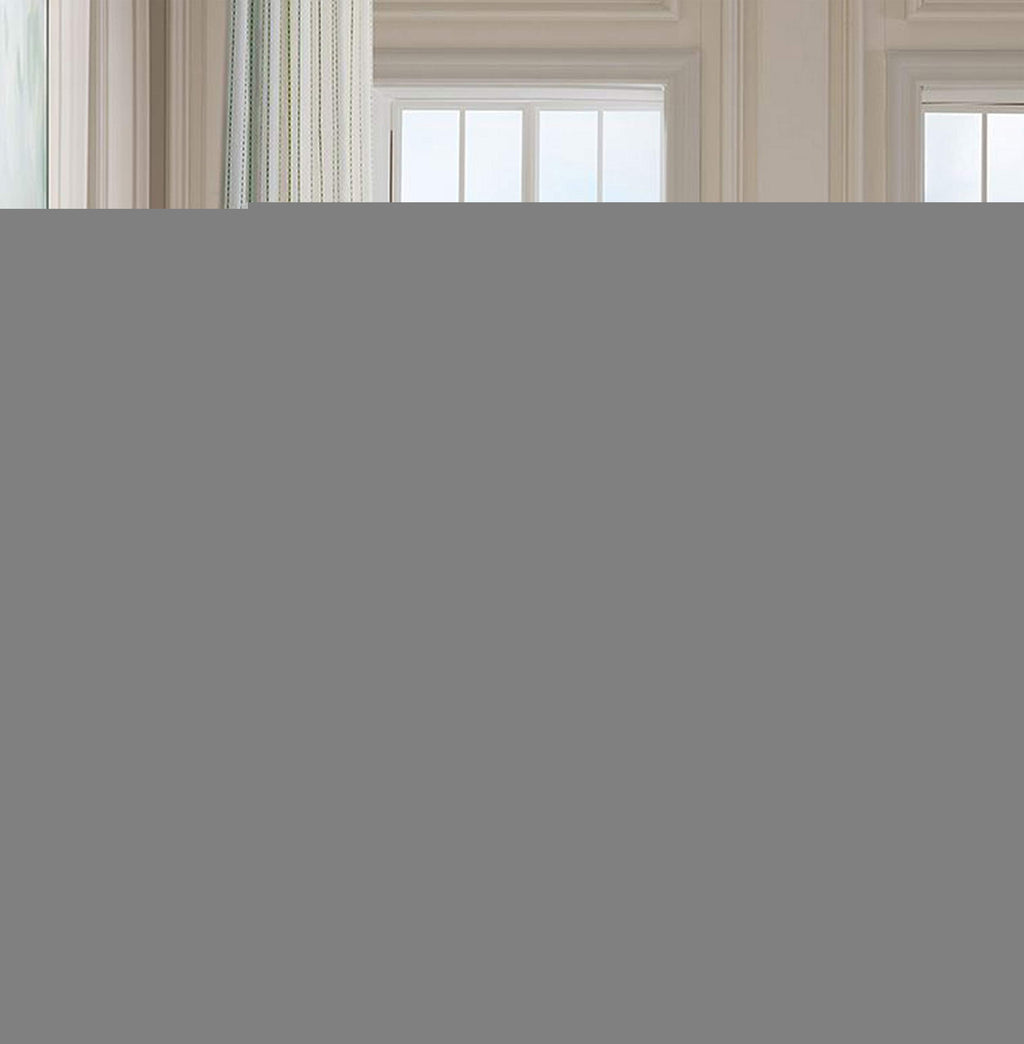 A large solid gray rectangular block obscures most of the frame, with only a small sliver of an interior room scene visible at the top edge including cream walls, molding, and a window.